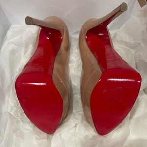 Christian Louboutin Tan Heels with Red Soles